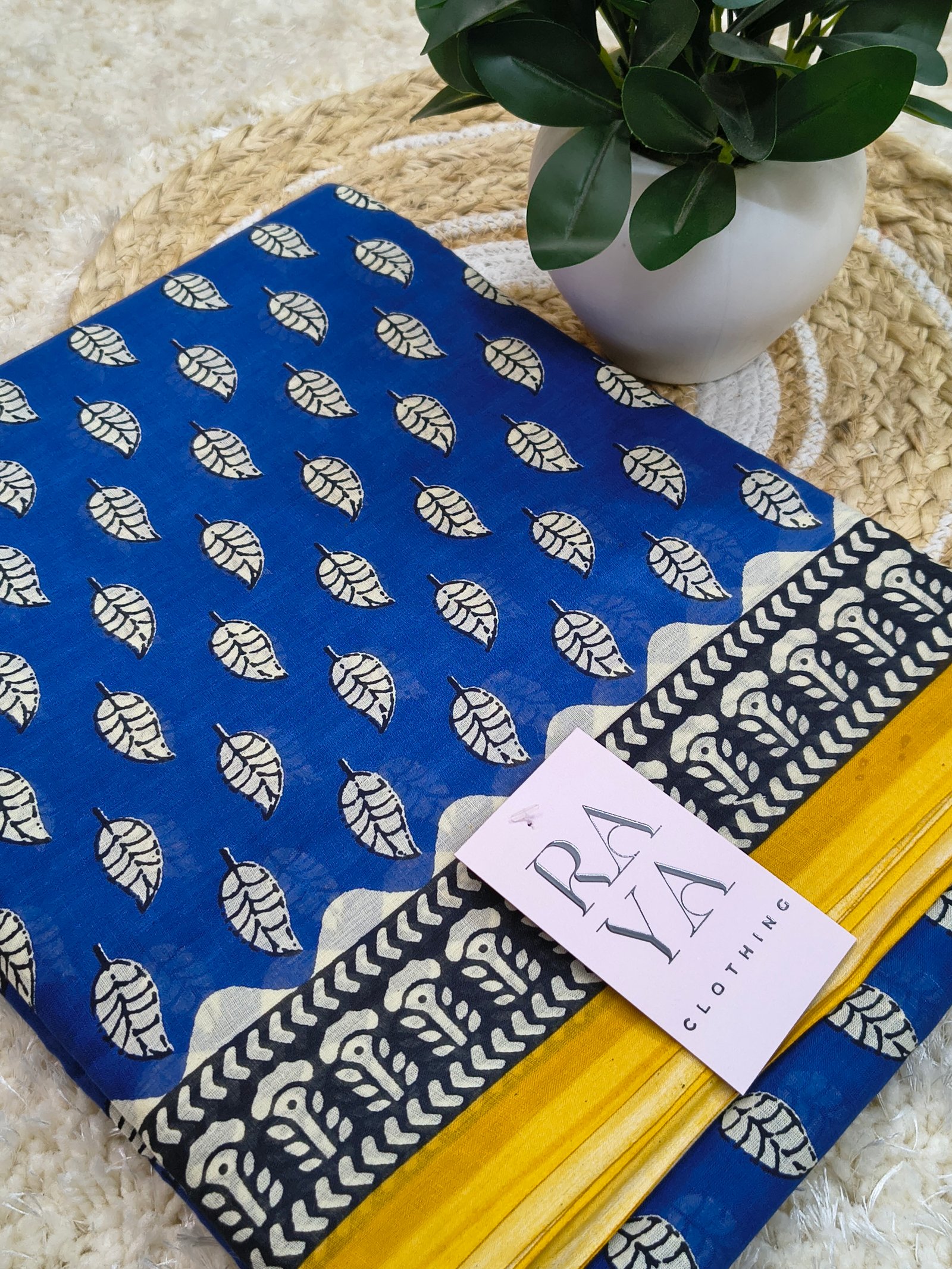 Blue and Yellow Printed Cotton Saree  with Leaf Motifs.