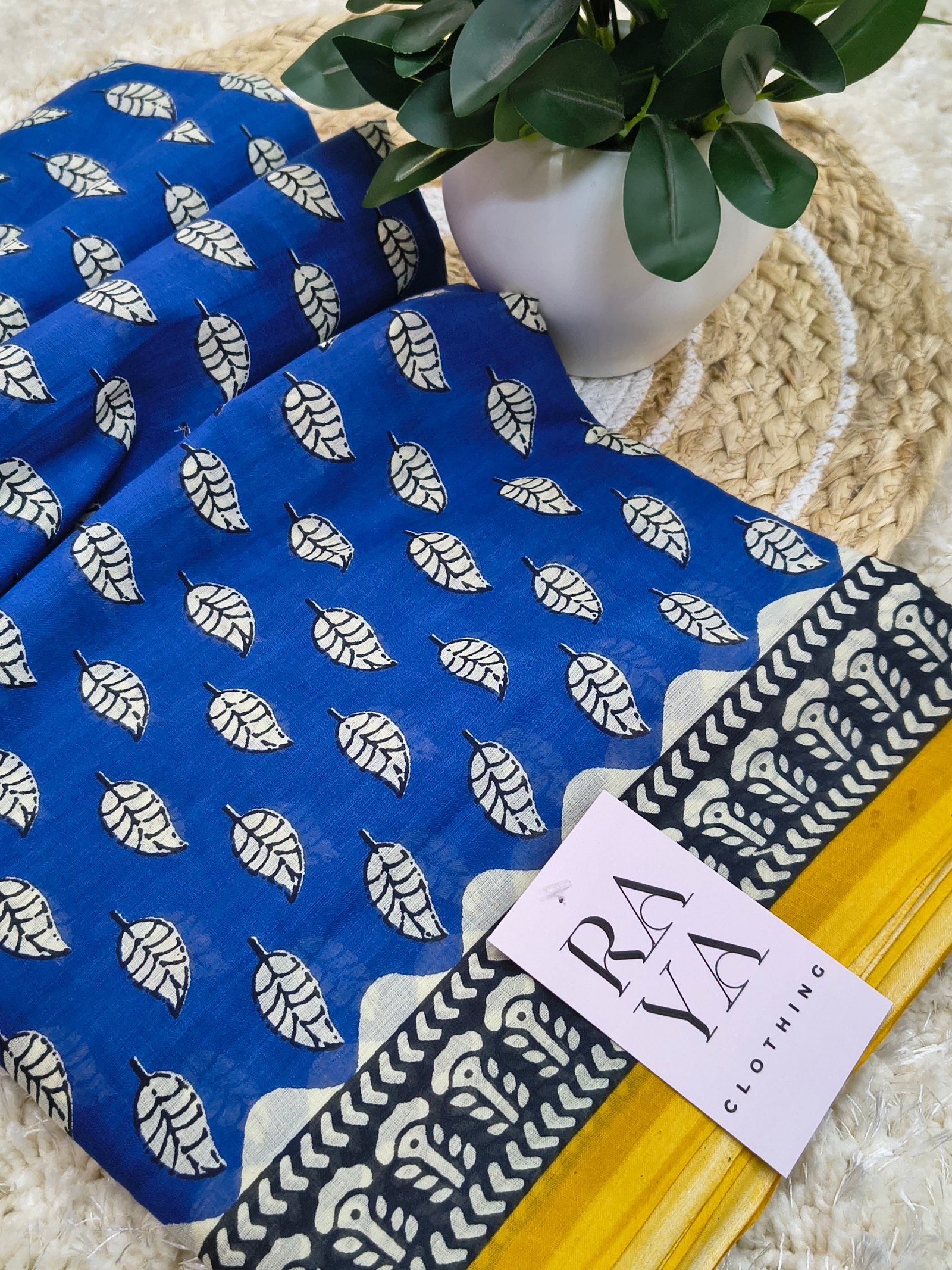 Blue and Yellow Printed Cotton Saree  with Leaf Motifs.
