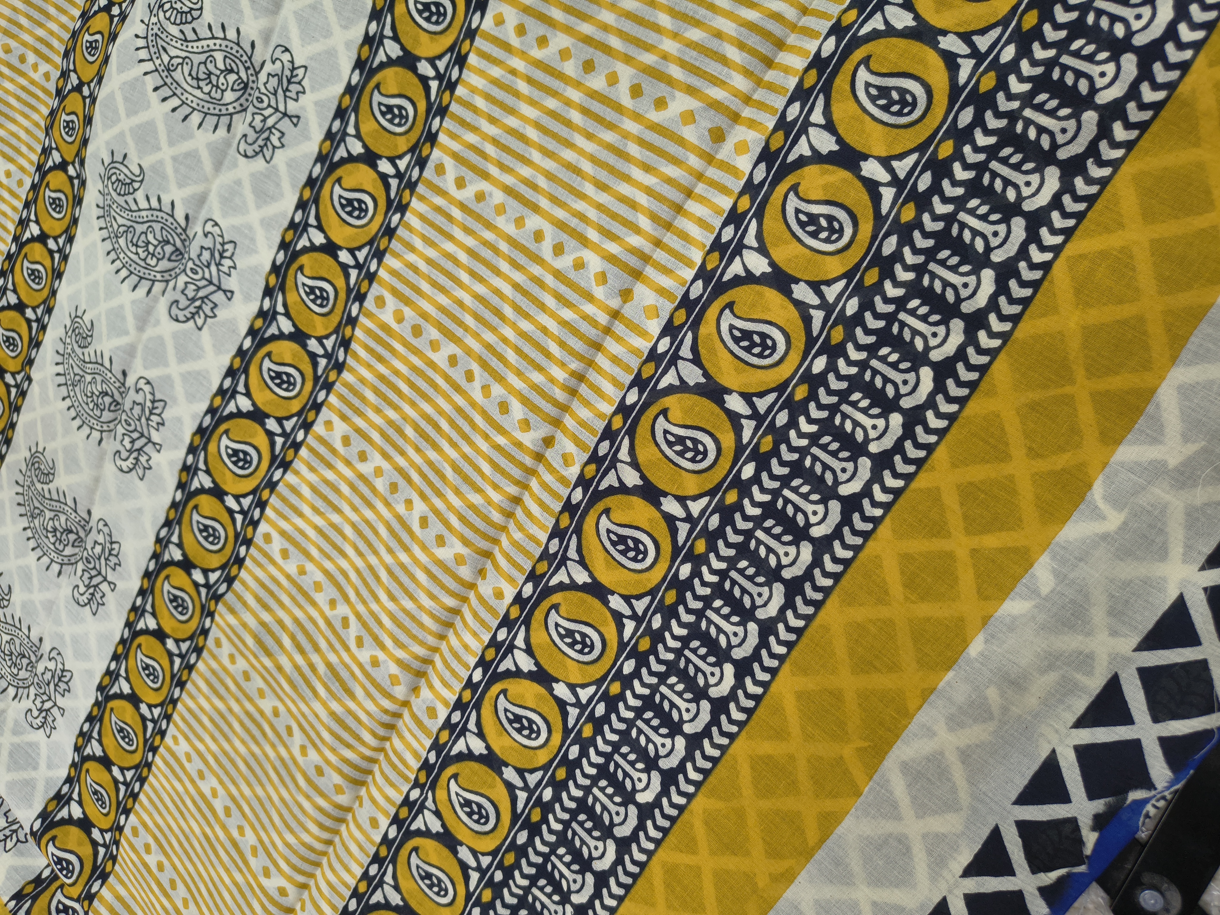 Blue and Yellow Printed Cotton Saree  with Leaf Motifs.